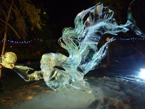 sixpenceee:Pretty amazing ice sculptures