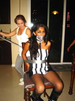 xylentum:  Duct taped by her kinky girlfriend!SELFGAGS rating: 10