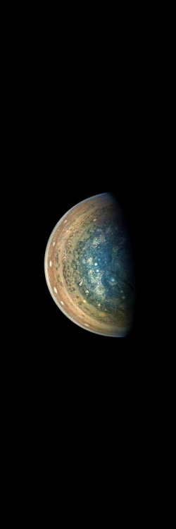 The view from here. This color-enhanced image of Jupiter’s swirling south polar region was cap