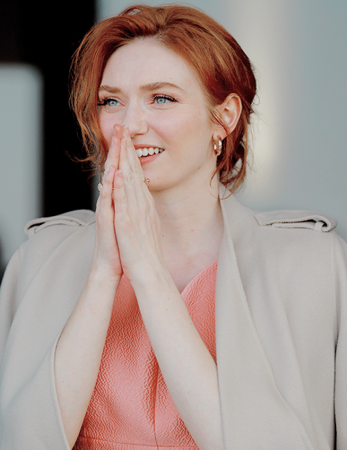 eleanor tomlinson watches the racing as she attends day three &lsquo;grand national day&rsqu