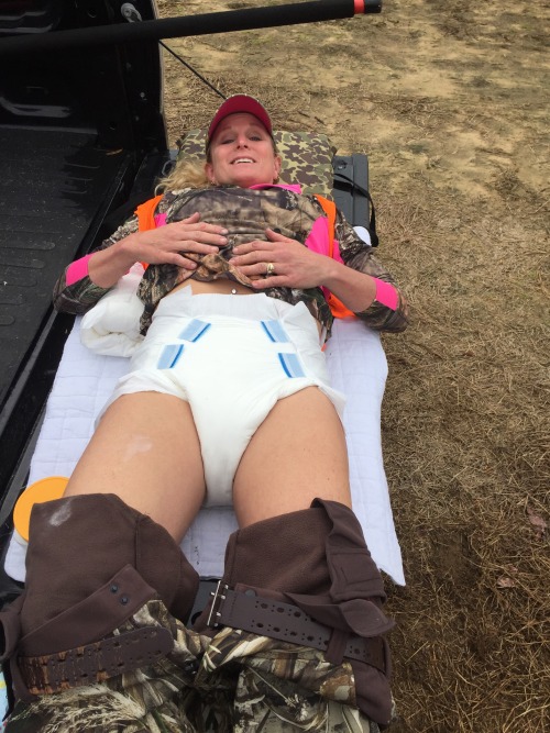 thebambinogirl:  I went hunting again yesterday and seen some nice deer but nothing I want s to shoot. We had to much equipment inside the truck so Daddy used the tailgate of the truck as a diaper changing table. I felt like a real baby having my diaper
