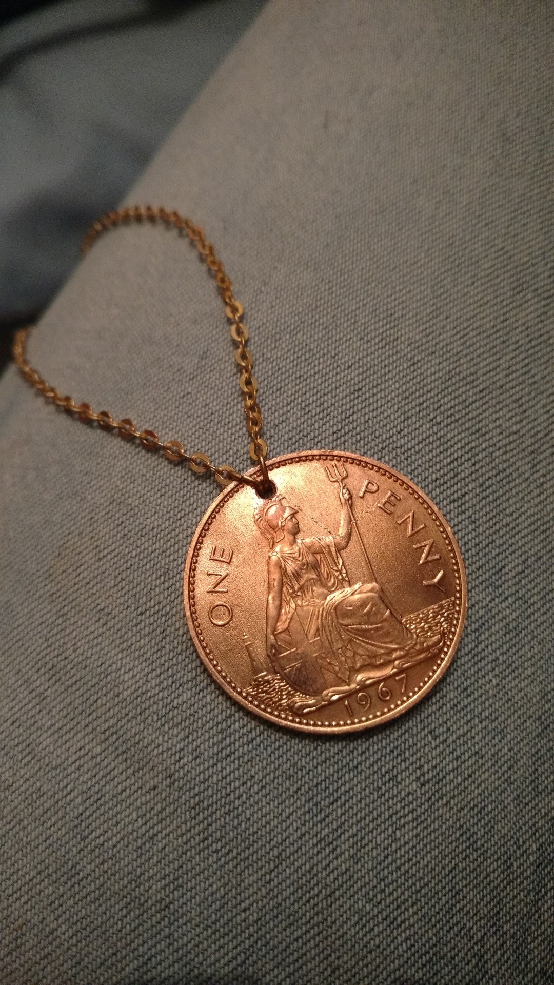 I made a penny shine, and hung it by gold across my breath.In other words, I made