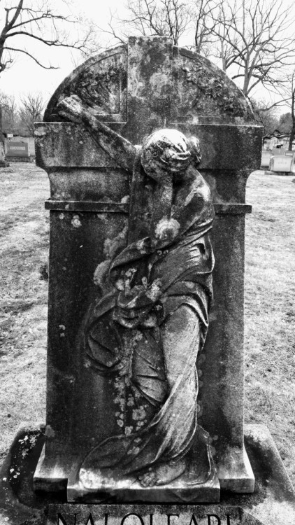 swforester: Standing in front of the cross, she points to  heaven. St Michael’s cemetery 3 26 17