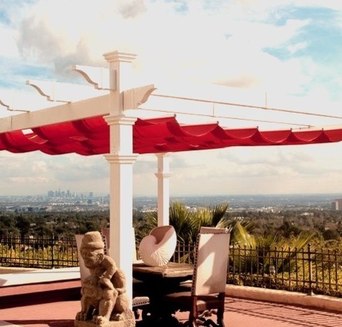 Deck - Contemporary DeckMid-sized Trendy Backyard Deck Photo With An Awning
