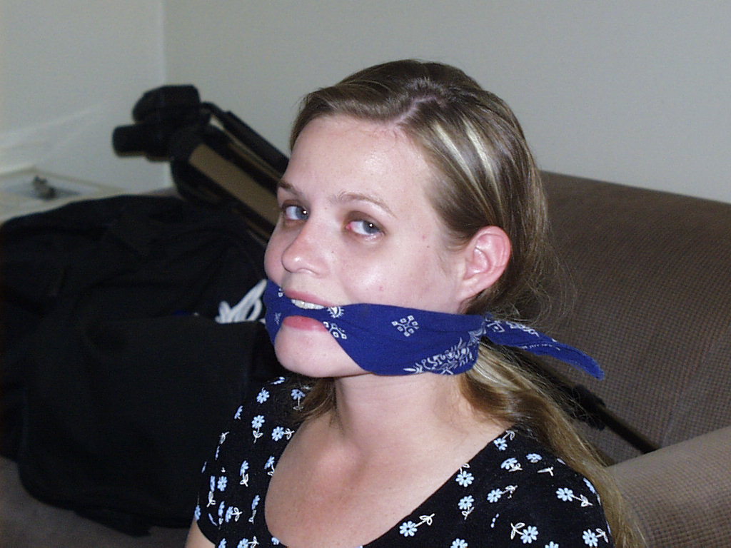 graybandanna:  Tied to a chair with a big blue bandanna gag 