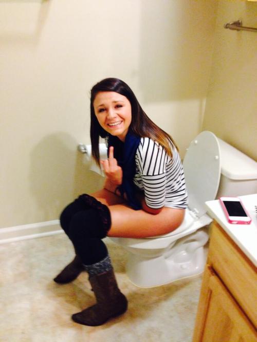 Girls Sitting on the Toilet