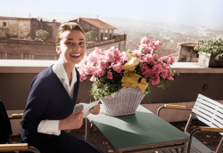  Audrey Hepburn on the terrace of the Hotel