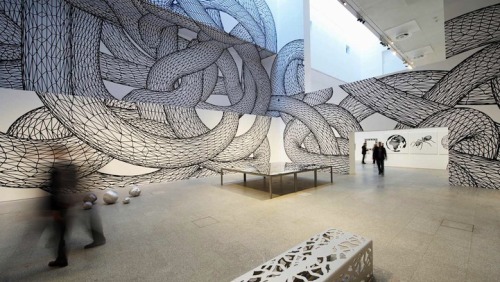 mymodernmet:Peter Kogler’s geometric patterns transform flat, white walls with illusions of dizzying underground tunnels. 