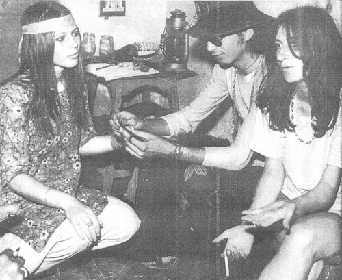 historicaltimes: Pakistani hippies roll up a joint in Karachi, 1973 via reddit