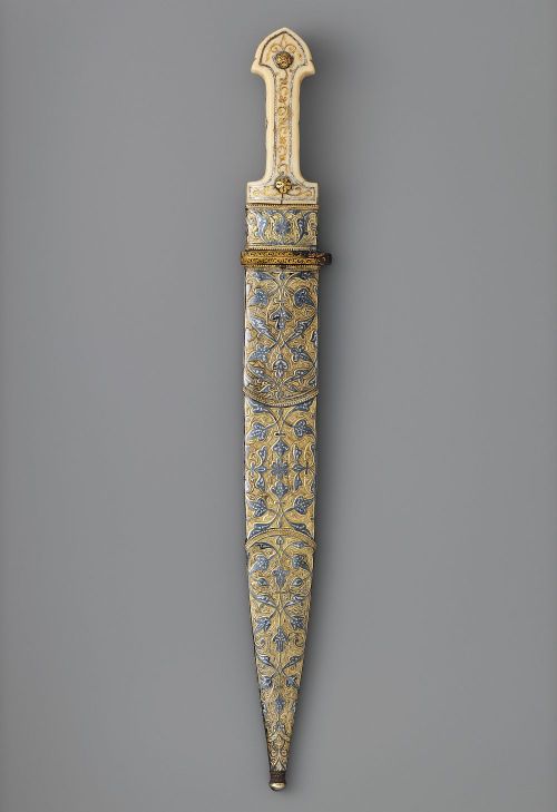 art-of-swords:  Qama Dagger with Sheath and Knife Dated: dated, 1856–57, 1861 Culture: Caucasian Medium: steel, bone, silver, gold, shark skin, ivory, niello, iron Measurements: Dagger (a); L. with sheath 19 ¼ in. (48.9 cm); L. without sheath 19 1/16