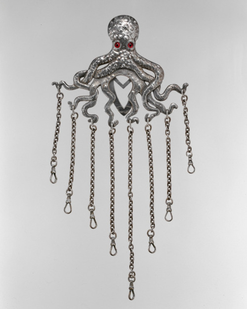 archiemcphee:  This gorgeous, tentacular object is an American chatelaine dating back to 1887. A chatelaine is a decorative belt hook or clasp worn at the waist with a series of chains suspended from it. They were worn by many housekeepers during the