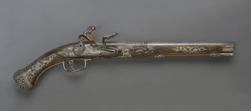 Flintlock pistol crafted by Diomede Adventi with barrel made by Lazarino Cominazzo, Italy, 1685.from