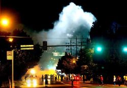 saintkieren:  Some of the most striking, war zone-like, almost hellish looking images from the ongoing peaceful protests in Ferguson, Missouri over the murder of unarmed teenager Michael Brown. 