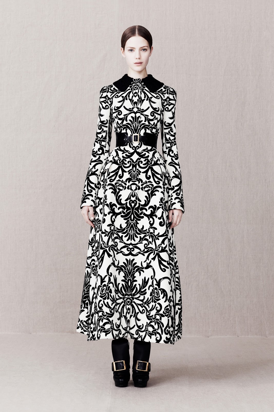 gothiccharmschool:  The black &amp; white coat! Lots of interesting, pretty designs
