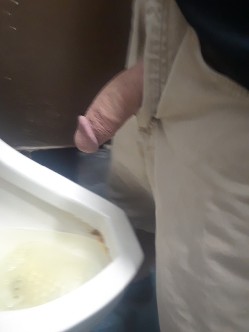 Showing my soft cock to the muscle giy at the urinal next to me.