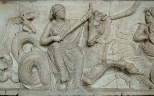 Doris, minor sea goddess and mother of Amphitrite, rides a hippocamp and carries two torches to ligh