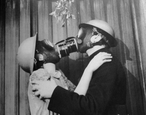 weirdvintage:A member of the Auxiliary Fire Service takes a break from the Blitz, Christmas 1940 (