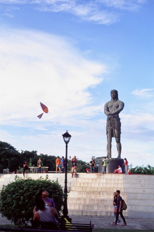 Philippines on Film: Father and son flying kites in Luneta, May 2015Olympus OM-40 + Fuji Velvia 50 (