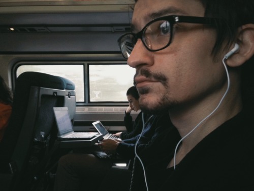 loverscarvings:  My first time riding the train with my love muertosonador ! We’re not miserable, just exhausted. NYC we comin