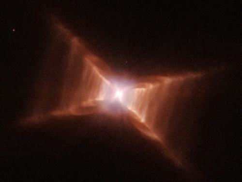 just–space:  Not a very common shape to see in the heavens, this is the Red Rectangle Nebula.  js 