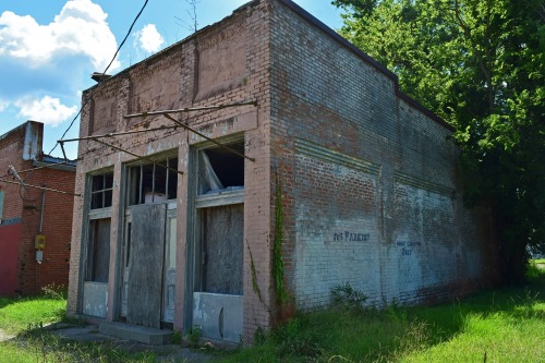 An abandoned building in Colfax, Louisiana.  The charred ceiling tells us there was a fire in i