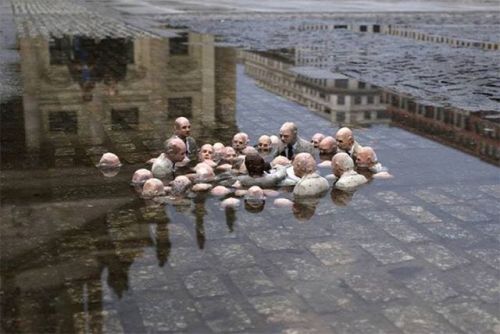 socialismartnature:This sculpture by Issac Cordal in Berlin is called “Politicians discussing 