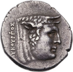 archaicwonder:  The Greek River God AchelousThis silver stater shows the head of Achelous as a horned man-faced bull. The reverse shows Apollo seated, holding a bow; with an inscription AKAPNANON; ΘE monogrammed (reverted) to the left. This was minted