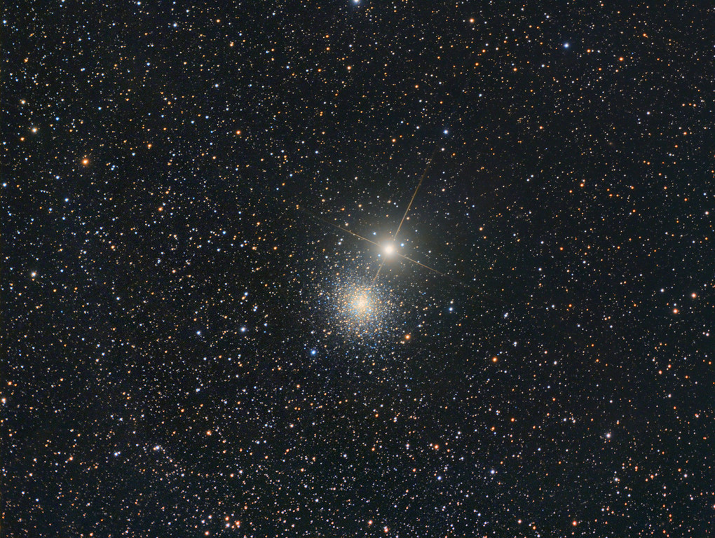 cosmicvastness:  NGC 5286 and M Centauri NGC 5286 is a globular cluster located approximately