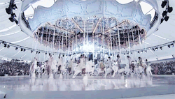 deprincessed:  Magical Motion: Tiara clad models sit atop porcelain ponies on the huge pastel carousel that featured at Louis Vuitton Spring/Summer 2012, the whimsical creation both enchanted spectators and sent photographers into a frenzy due to it’s