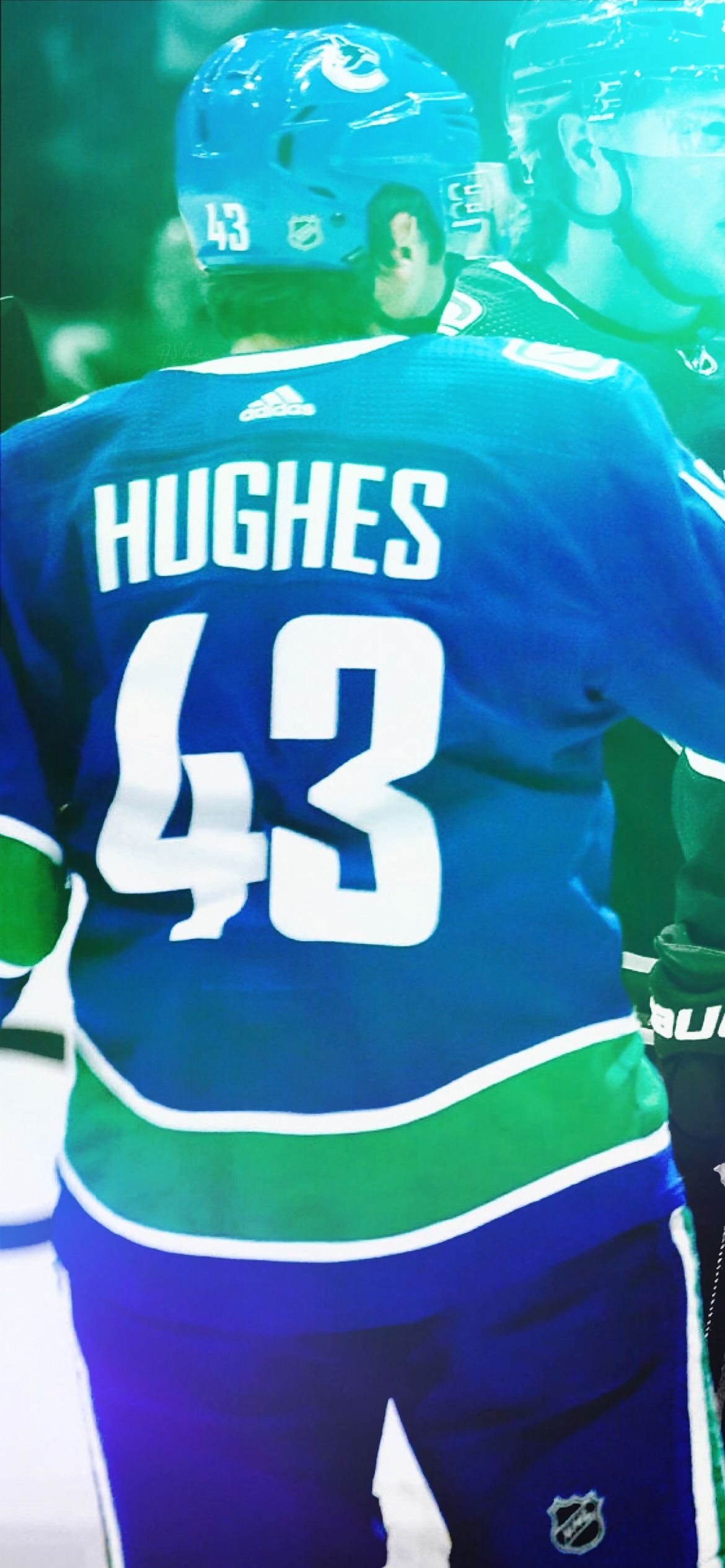 Download Quinn Hughes in Retro Black Jersey during Game Opening Wallpaper