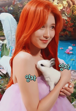 s-anas: sana with an excited bunny 🐰
