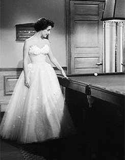 barbarastanwyck:  Elizabeth Taylor wearing an Edith Head designed dress in A Place