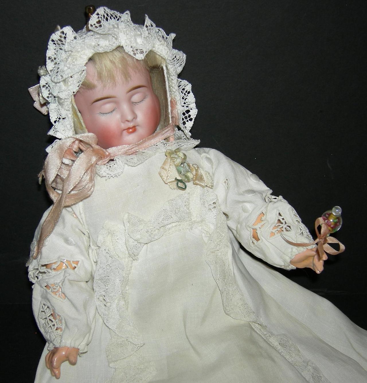 antique three faced doll