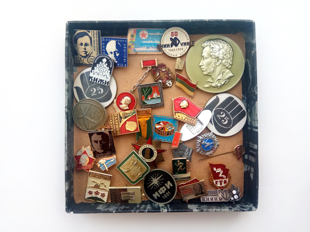 I found this box in the attic the other day. These pins belonged to my grandfather.