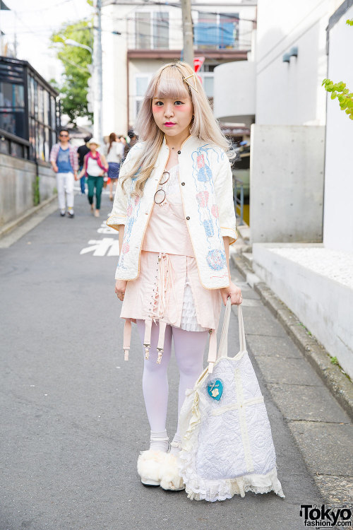 Yumi on the street in Harajuku with cult party kei-inspired makeup, pastel resale/vintage fashion, a