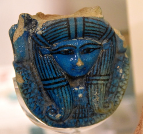 Faience head of the ancient Egyptian goddess Hathor, from the handle of a sistrum (rattle).  Ar