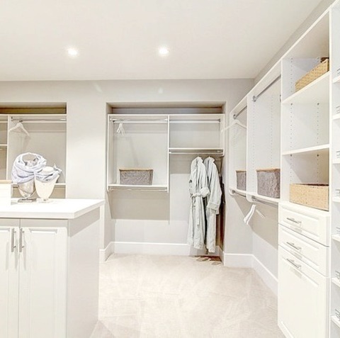 Closet San FranciscoLarge Gender-neutral Carpeted And Beige Floor Walk-in Closet Photo With Shaker Cabinets