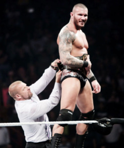 Randy bulging as Triple H straps the WWE