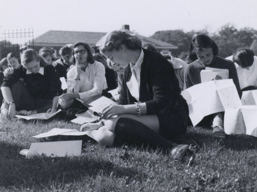 inthedarktrees - Students reading outside on the grass, Bryn Mawr...