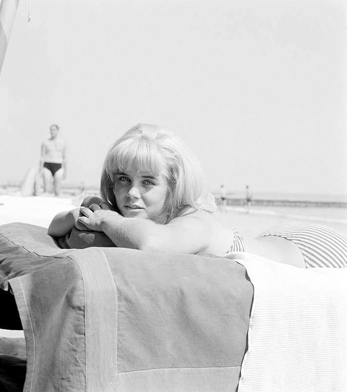 mabellonghetti:  Sue Lyon, wearing a a striped strapless bikini, portrayed while