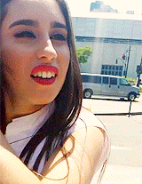 5harmonism:  Lauren climbing on a wall to greet fans and take pictures with them 