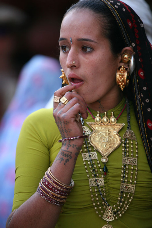 arjuna-vallabha: Gujarati woman with traditional jewellery  And traditional tattoos. .