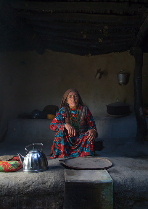 Portrait of an afghan woman in pamiri traditional clothing, Badakhshan province, Wuzed, Afghanistan.