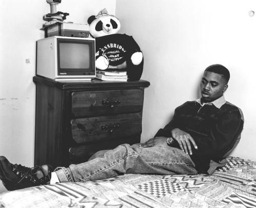 hiphopphotomuseum:  Young Nas. Taken in his bedroom at the Queensbridge houses in New York City in 1993. Notice the stuffed animal and the bullet hole above his head. Photo and caption by Chi Modu. 