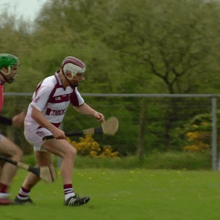 Adrian Chiles playing a game of hurling in “Christine & Adrian’s Friendship Test” s1e02