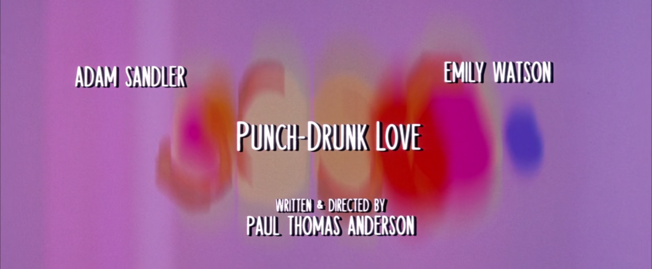 Punch-Drunk Love (2002)Director: Paul Thomas AndersonCinematographer: Robert Elswit Tech SpecsAspect Ratio: 2.39 : 1Cameras: Panavision Panaflex Platinum, Panavision Primo, C- and E-Series LensesNegative Format: 35 mm (Fuji Super F-125T 8532, Super F-250T 8552, Super F-500T 8572)Cinematographic Process: Panavision (anamorphic)Printed Film Format: 35 mm (Fuji) #punch drunk love #anamorphic#adam sandler #paul thomas anderson #emily watson#pt anderson#cinematography#lens flare