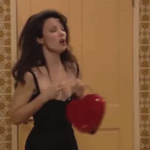 The Nanny: Season 3 Episode 3 Fran's red leather heart purse