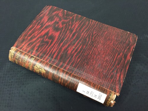 msulconservationlab:  Check out the incredibly cool red and black faux bois cover on this book! 