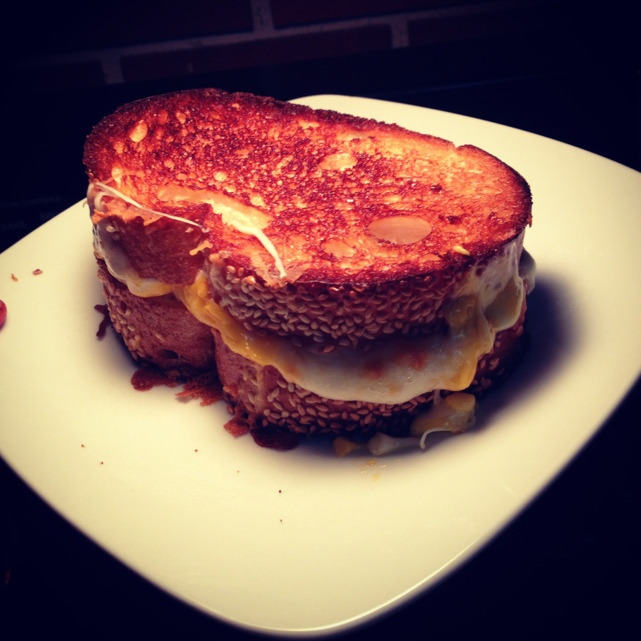 cookingbunch:  Swiss, mozzarella, and American cheese on Italian bread. Butter the