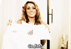 fullscircle:  Miley with uniforms of some brazilian soccer clubs. 